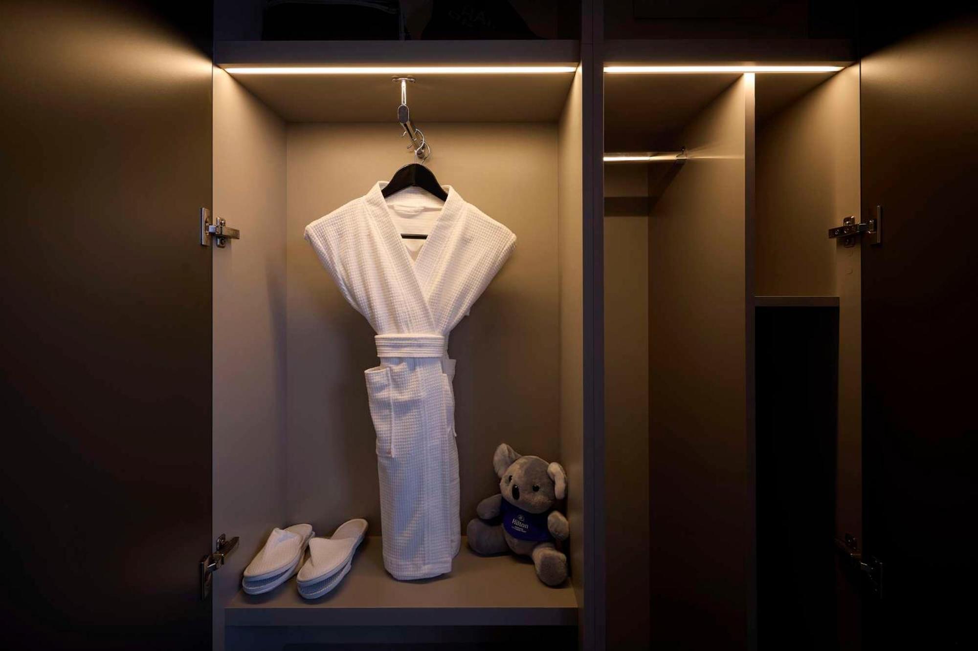 Hilton Melbourne Little Queen Street Exterior photo A bathrobe in a hotel room